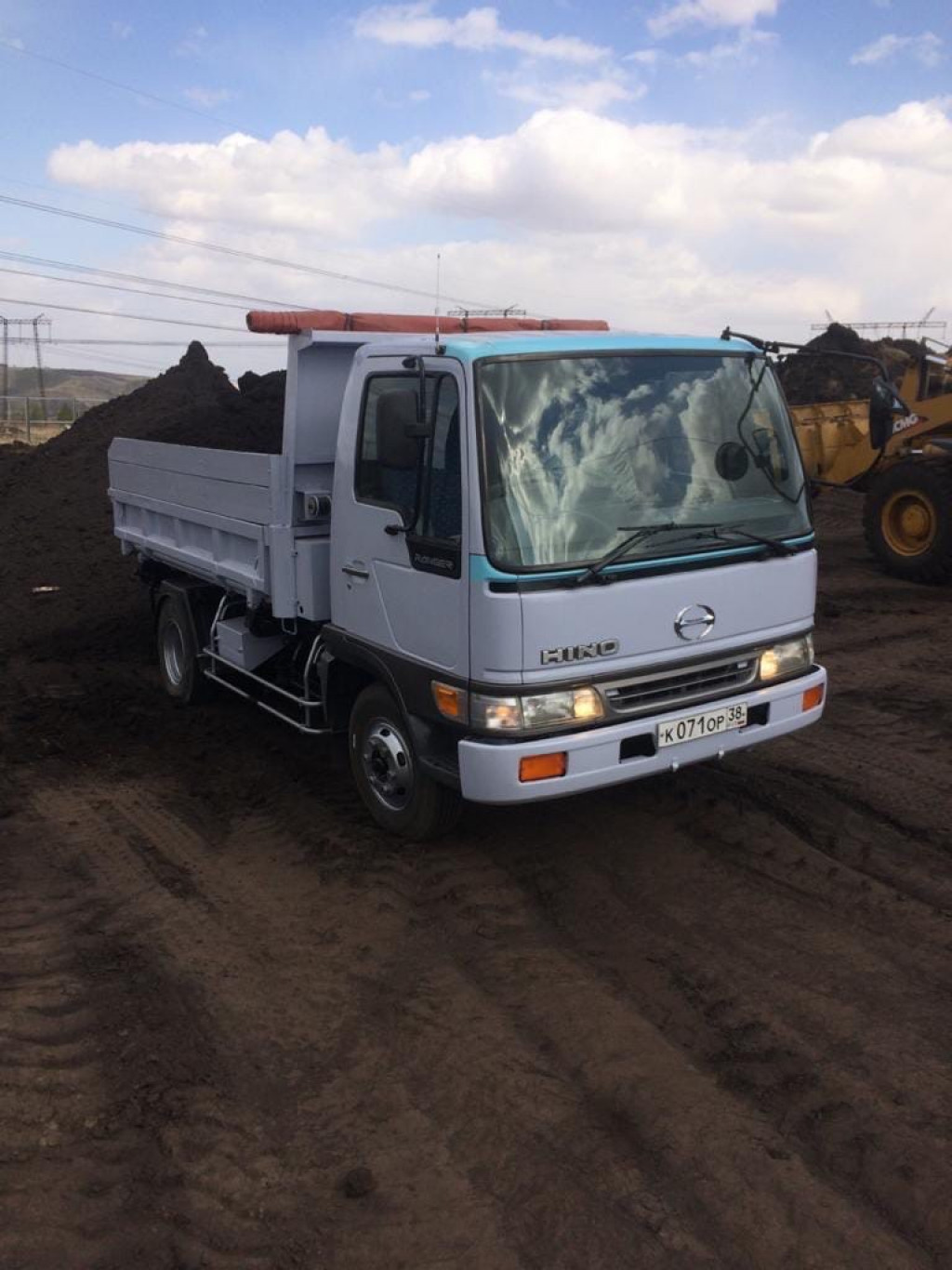 Услуги самосвала по доставке сыпучих грузов