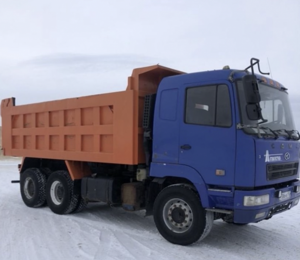 Услуги самосвала. Доставка сыпучих материалов.