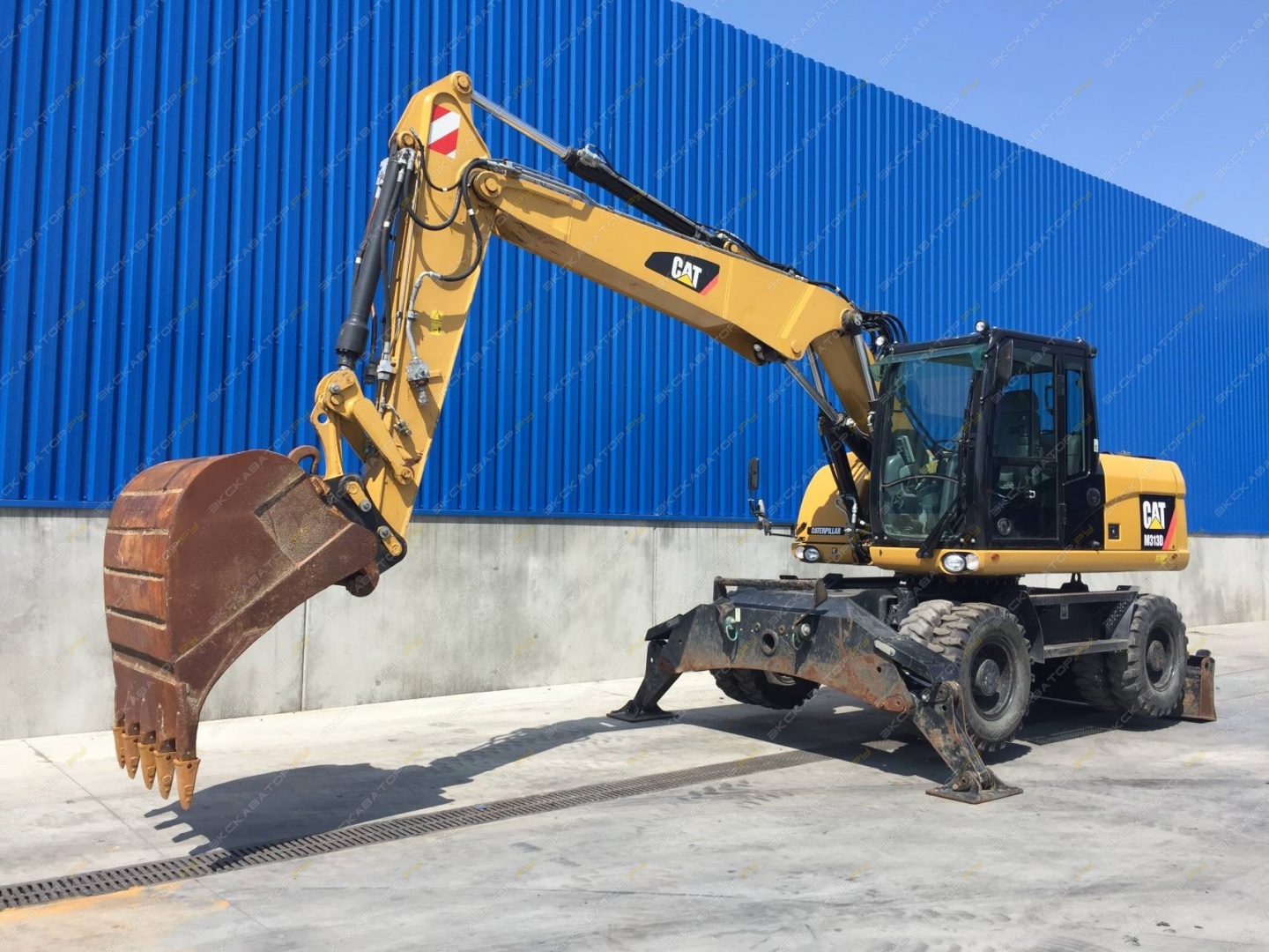 Аренда колесного экскаватора Caterpillar M318D