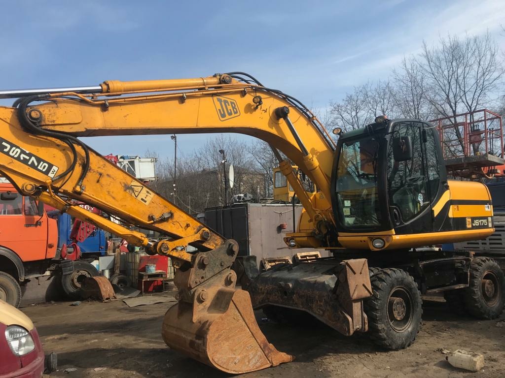 Экскаватор полноповоротный колесный в аренду