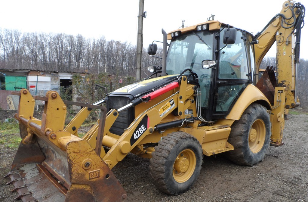 Аренда экскаватора-погрузчика CAT 428E