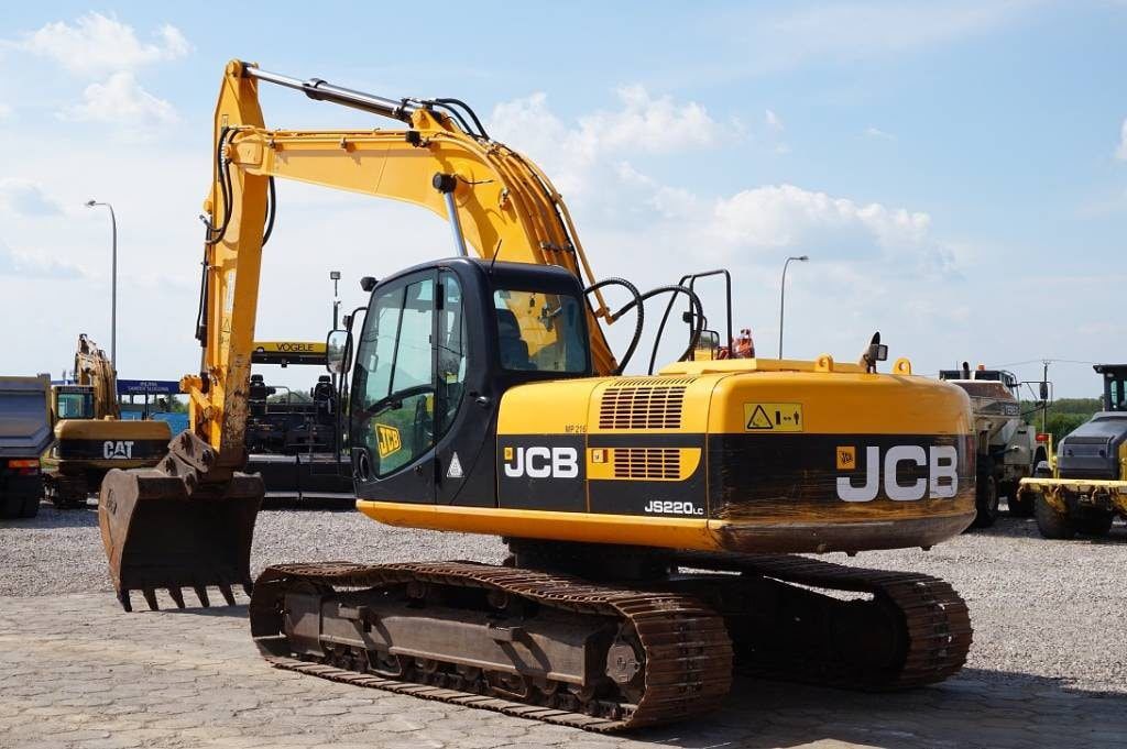 Гусеничный экскаватор аренда.