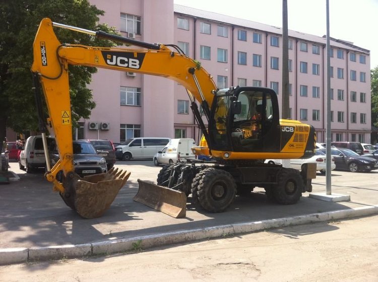 Аренда колесного строительного экскаватора