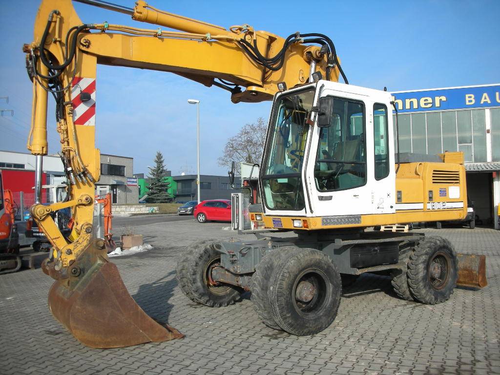 Аренда колесного экскаватора с планировкой