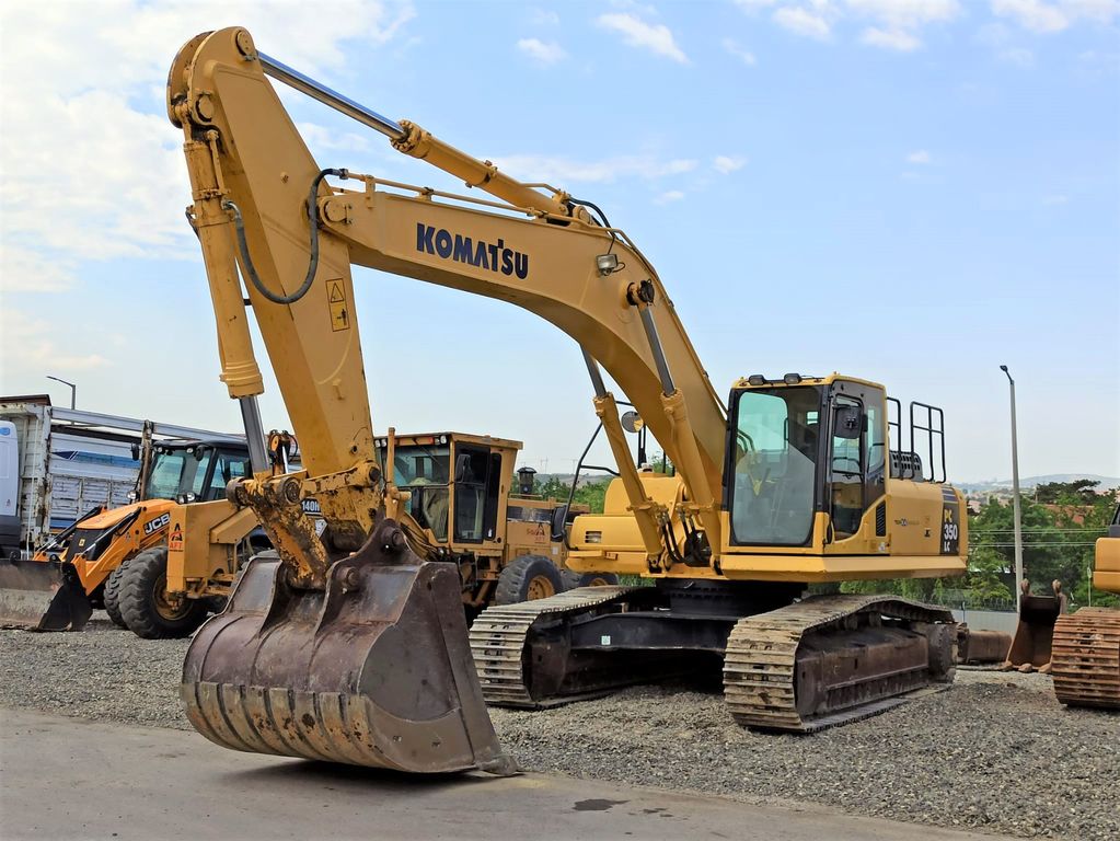 Экскаватор NEW HOLLAND