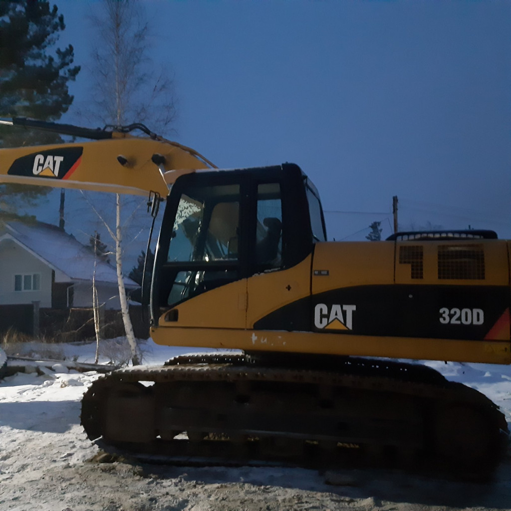 Услуги гусеничного экскватора