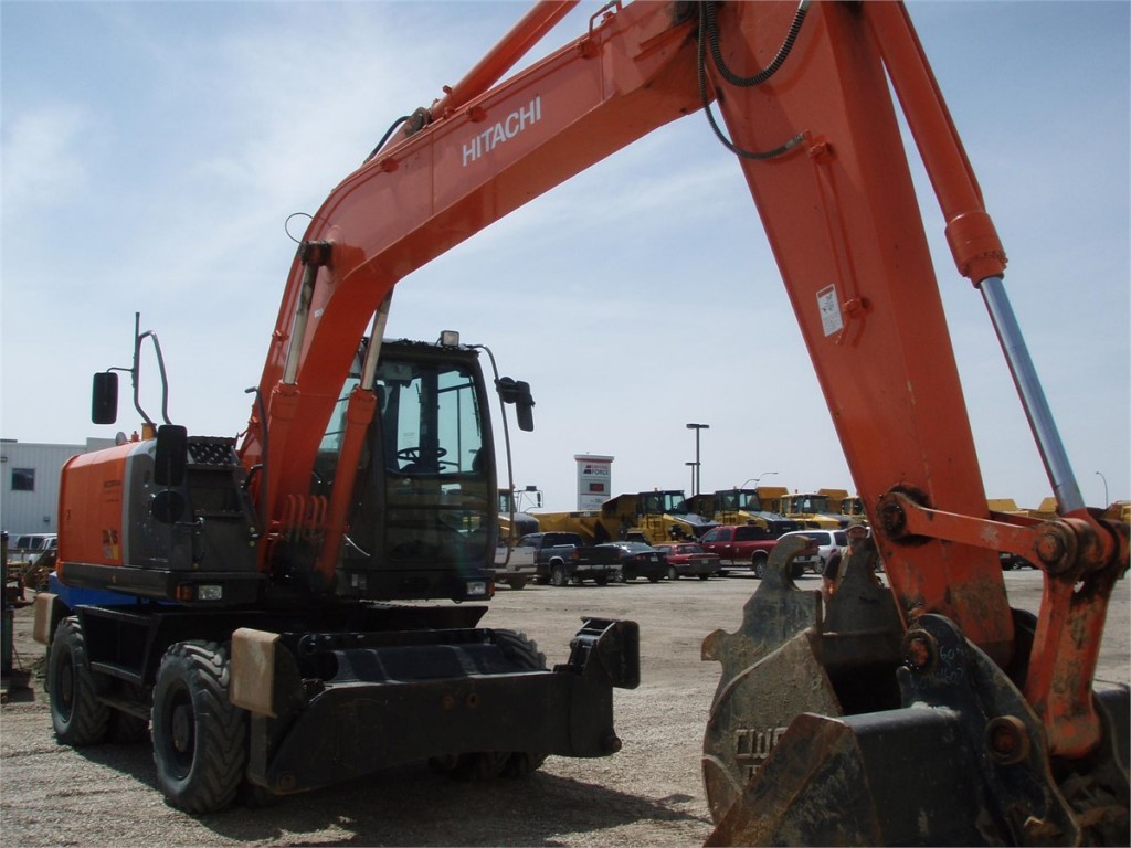 Услуги колёсного экскаватора