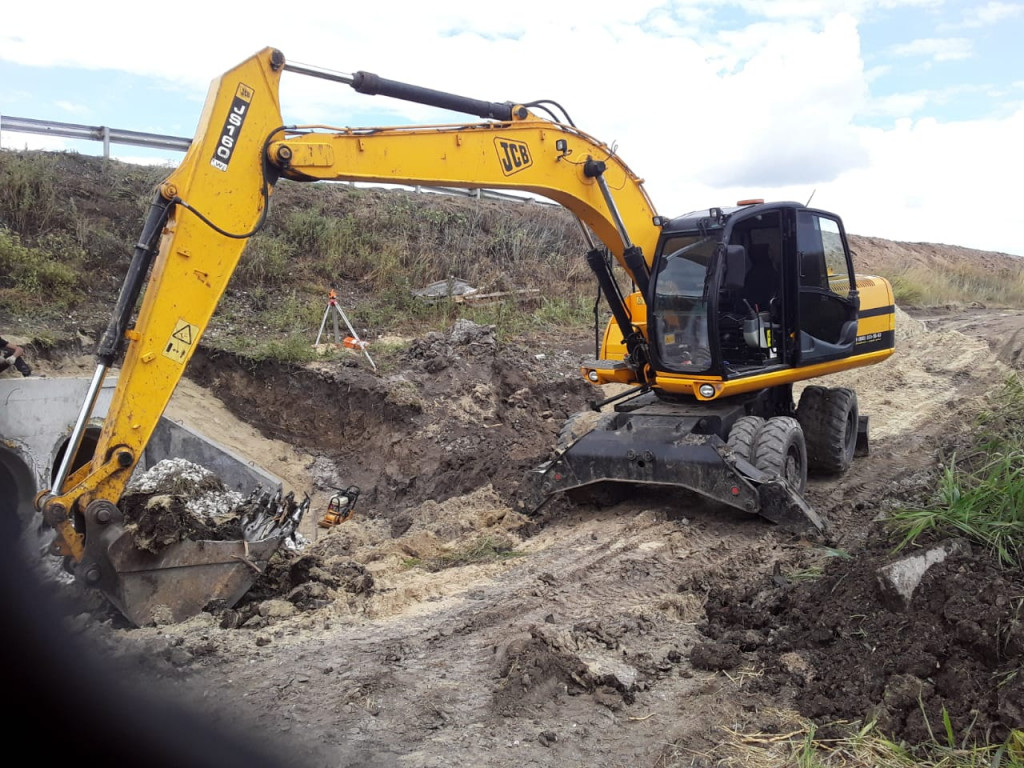 Аренда услуги колесный экскаватор. Спецтехника.