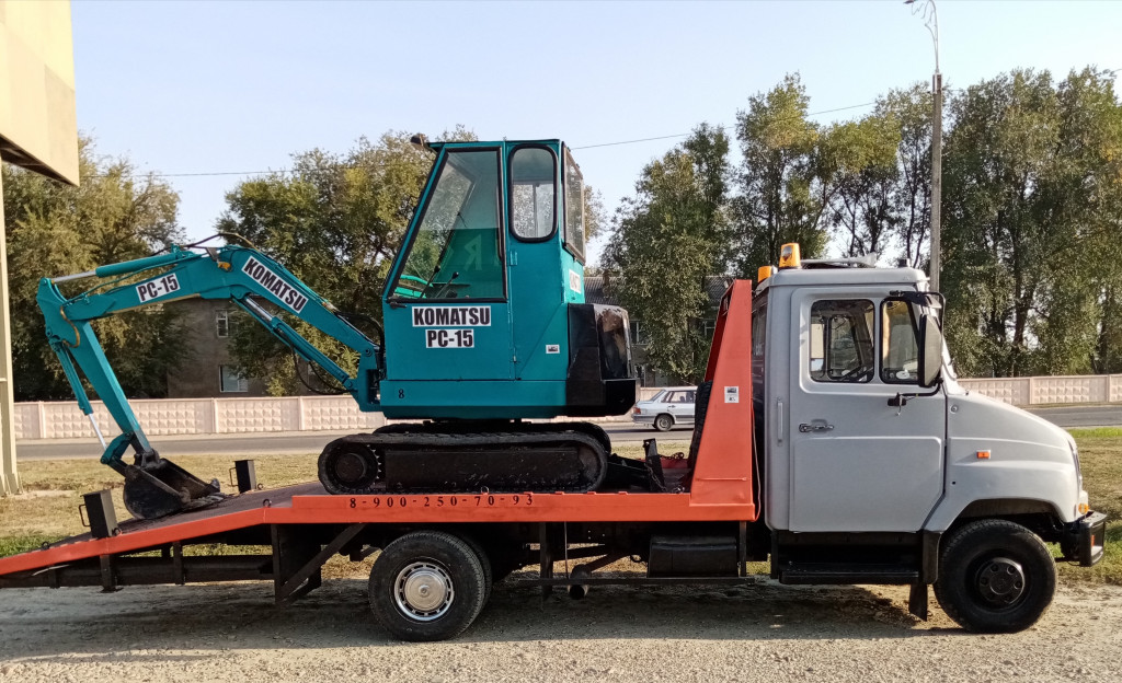 Услуги мини экскаватора. Земляные работы. Демонтаж