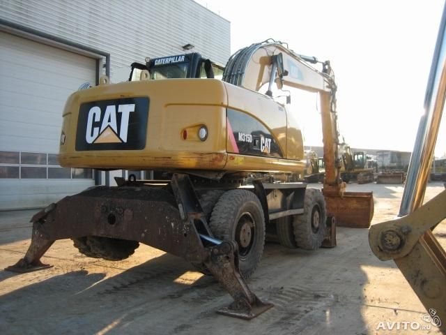 Экскаватор-колесный полноповоротный "CAT M315D"