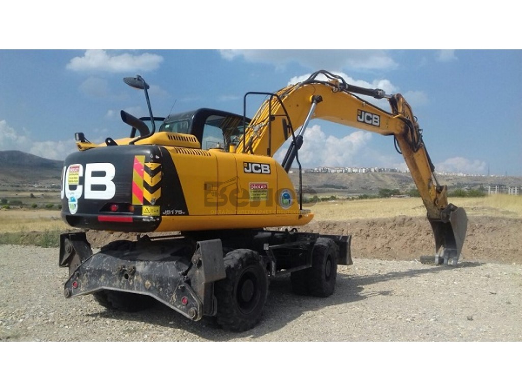 Аренда колёсного полноповоротного экскаватора