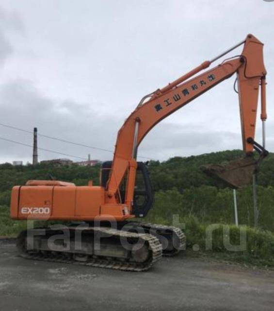 Услуги гусеничного экскаватора Hitachi EX200