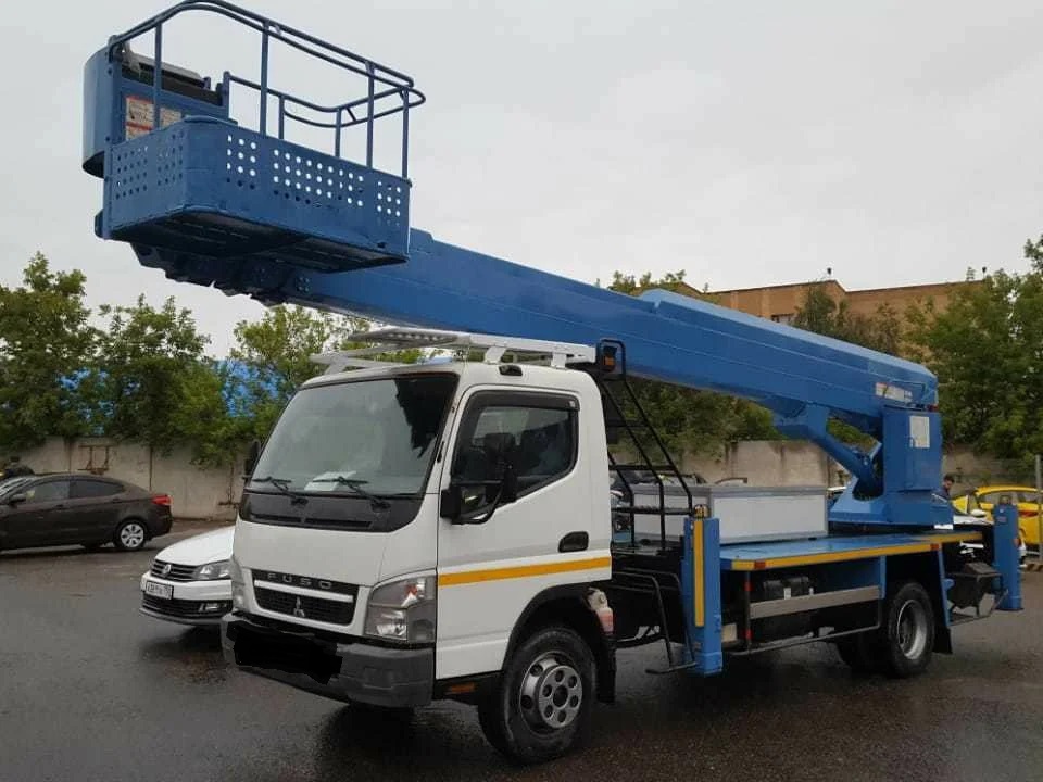 Услуги автовышки. Вышка в аренду. Высотные работы.