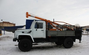 Услуга ямобур с краном БКМ-317-01 аренда